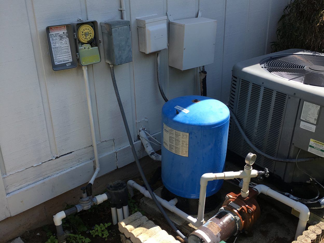 An old tank and distribution valve system upgraded to a new Digital/Electric valve system and tank